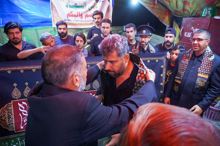 Imam Reza shrine servants present along Arbaeen pilgrimage route