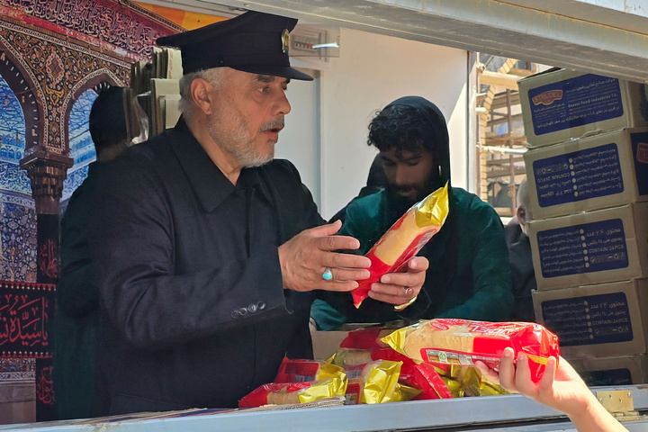 Mukib of Imam Reza Shrine stationed in Najaf