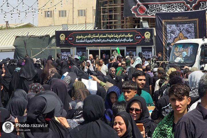 Imam Reza Shrine servants serve Arbaeen pilgrims in Najaf under Imam Reza’s banner Imam Reza Shrine servants serve Arbaeen pilgrims in Najaf under Imam Reza’s banner