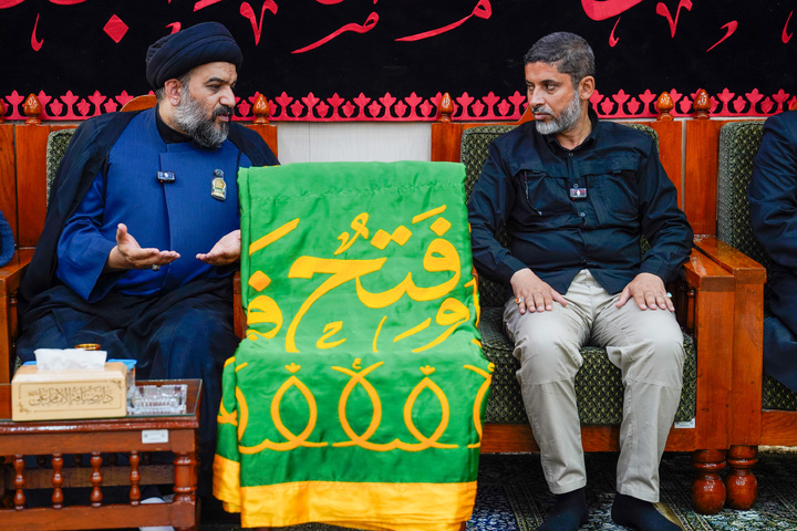 Imam Reza Shrine servants visit shrine of Imam Ali