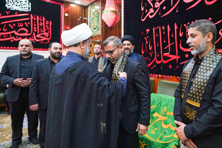 Imam Reza Shrine servants visit shrine of Imam Ali
