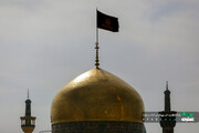 Imam Reza Shrine turns black on eve of Imam Ali martyrdom anniv