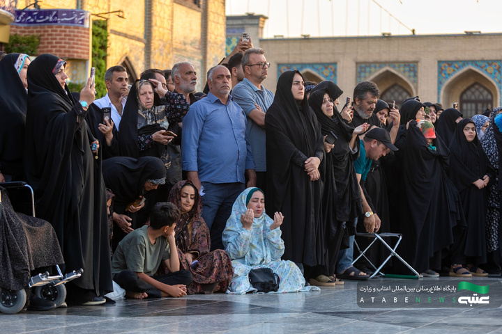 آیین تعویض پرچم گنبد و پوش ضریح مطهر رضوی
