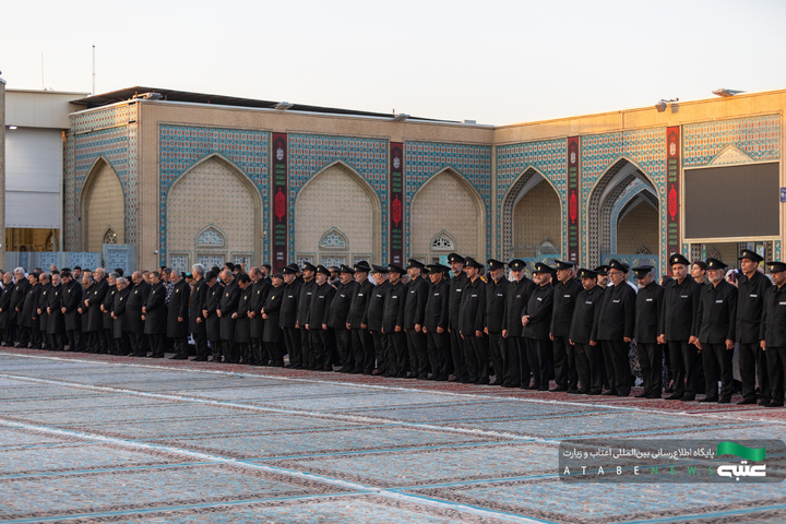 آیین تعویض پرچم گنبد و پوش ضریح مطهر رضوی